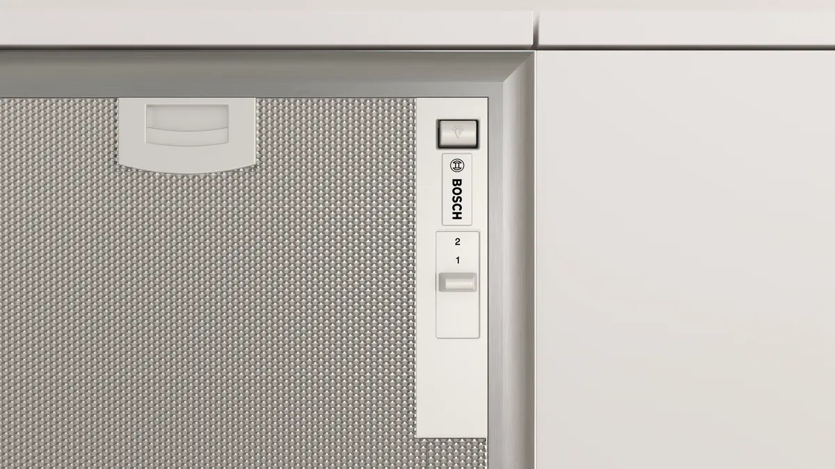 Cần gạt chọn tốc độ quạt và lưới lọc mỡ của máy hút mùi Bosch DHL755BM